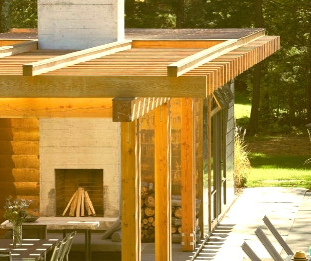 Pool house - large modern backyard stone and rectangular lap pool house idea