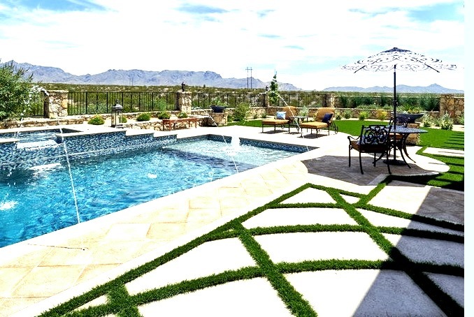 Mid-sized southwest backyard stone and rectangular natural pool fountain photo